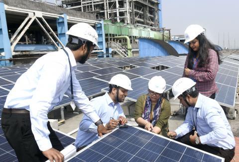 Working Employees at Solar Plant